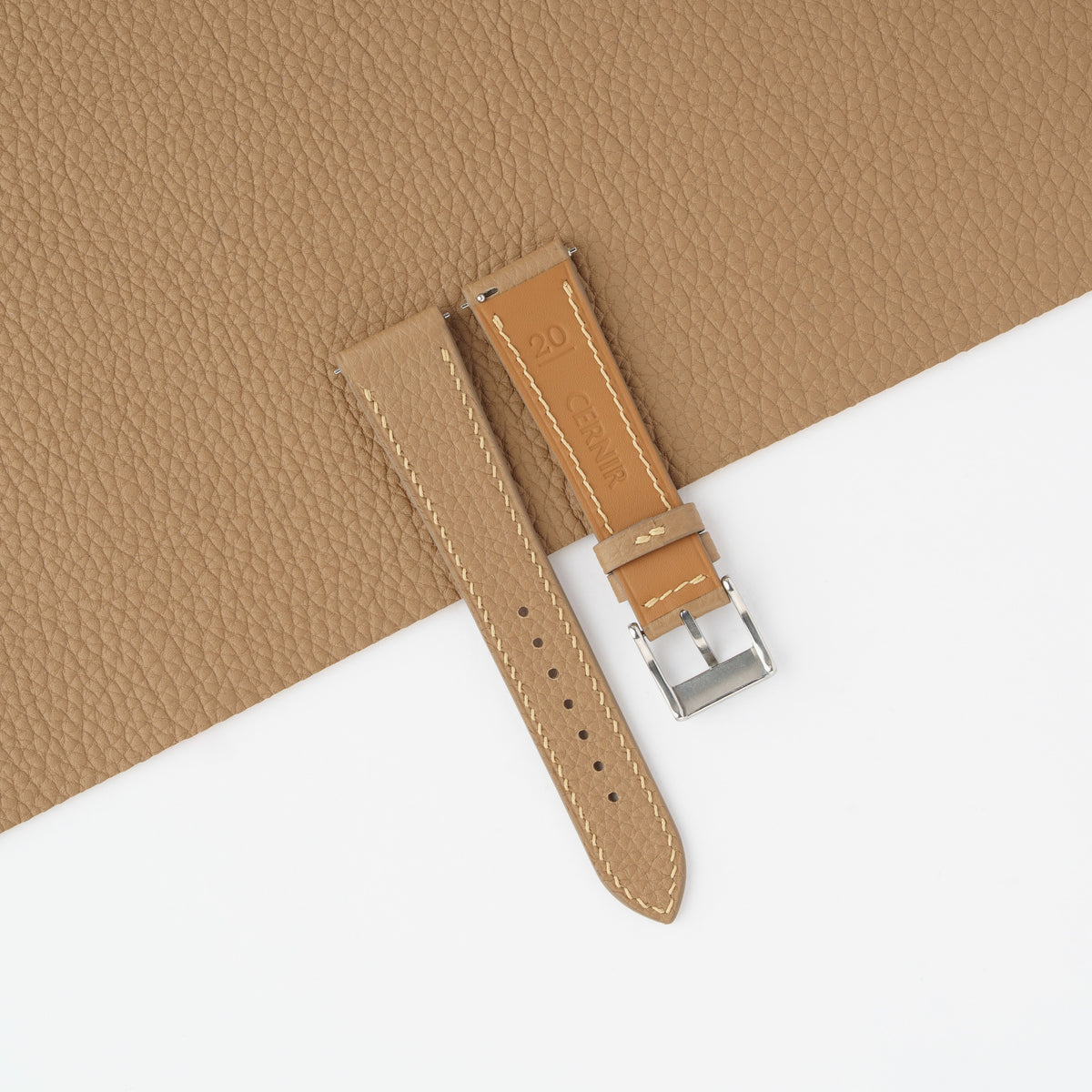 Golden Zermatt leather lining on the back of the beige Togo slim watch strap