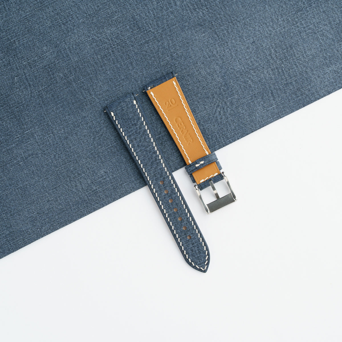 Golden Zermatt leather lining on the back of the denim blue Babele slim watch strap