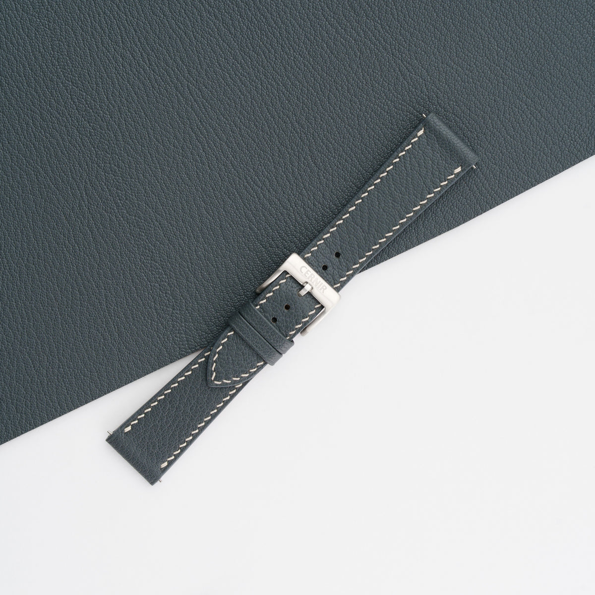 Grey Alran Chevre Sully slim watch strap buckled, showing the fine goatskin grain
