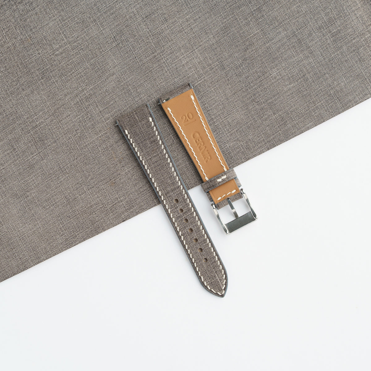 Golden Zermatt leather lining on the back of the grey Babele slim watch strap
