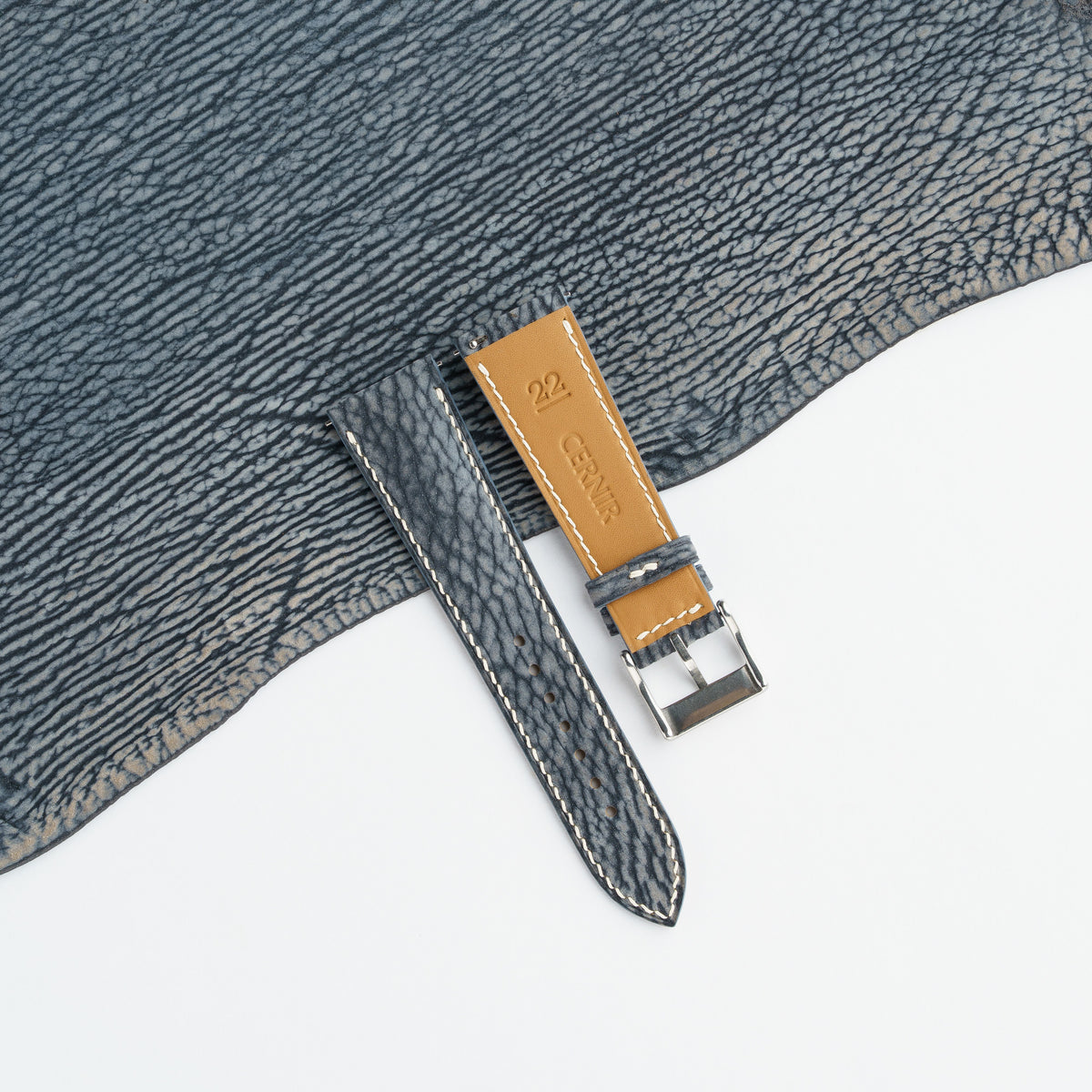 Tan Zermatt leather lining on the back of the grey blue shark padded watch strap