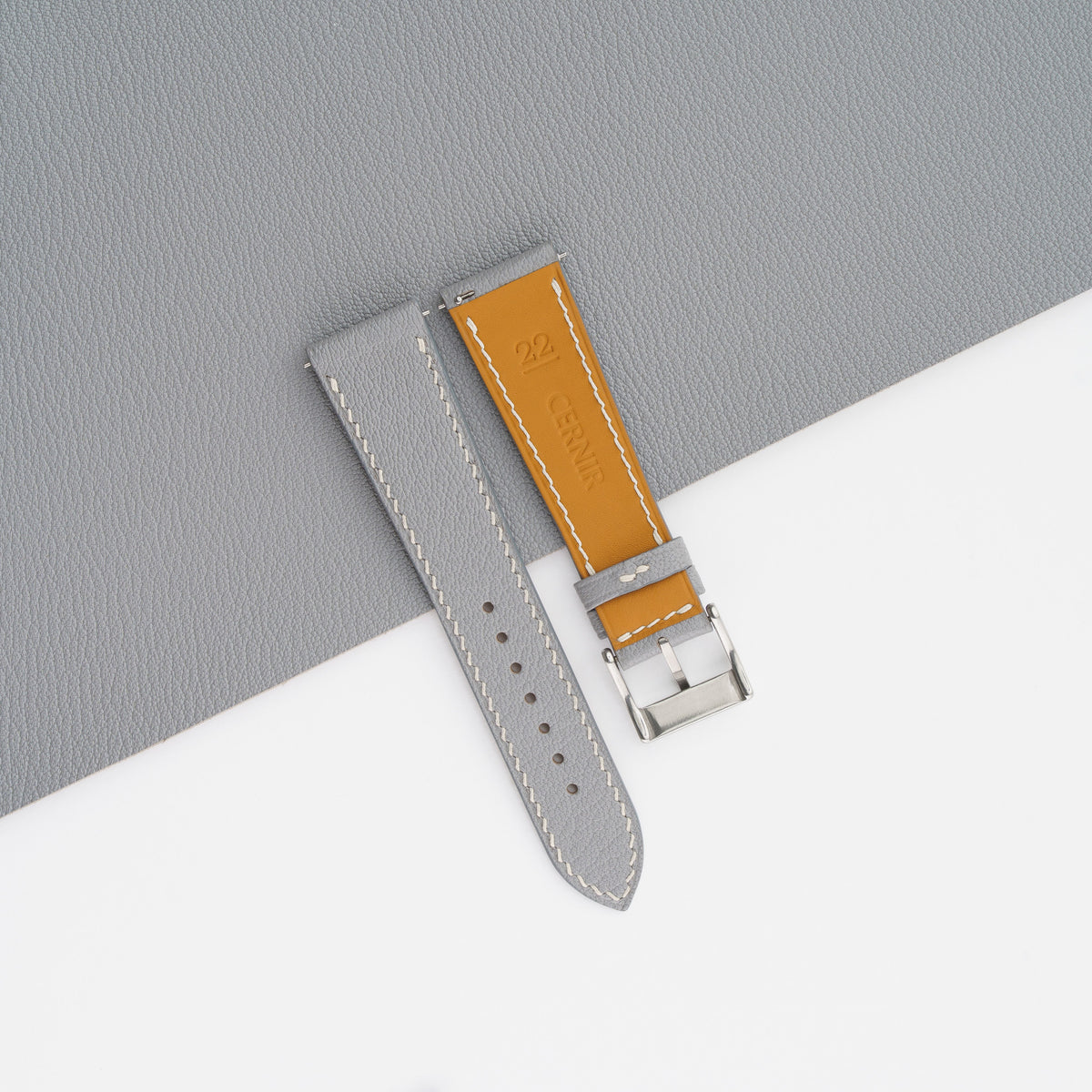 Tan Zermatt leather lining on the reverse of the light grey Alran Chevre Sully slim strap