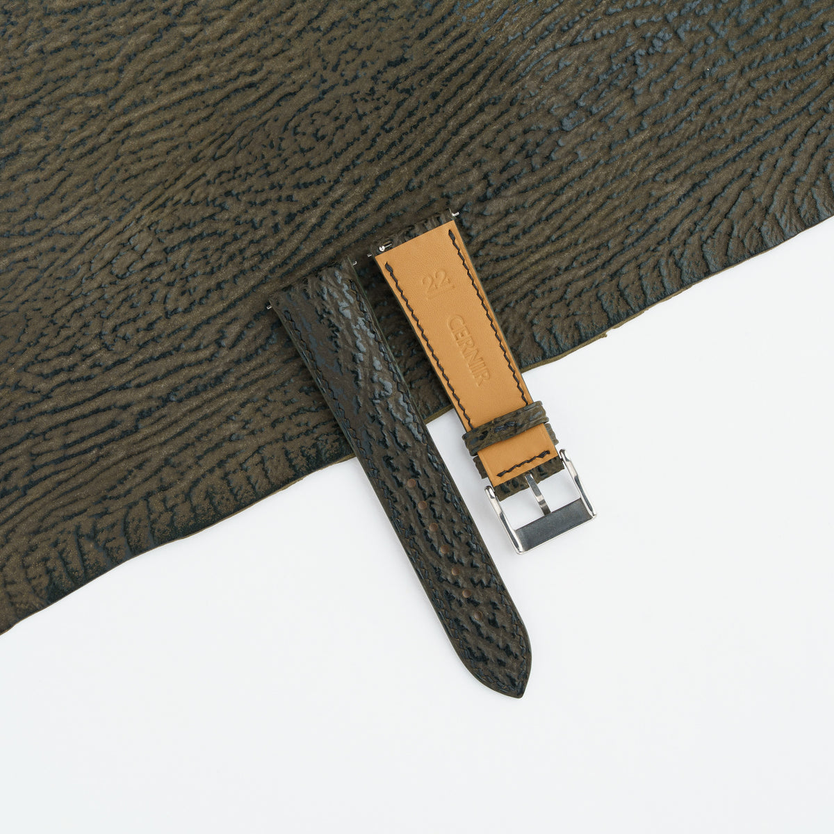 Tan Zermatt leather lining on the back of the olive brown shark padded watch strap