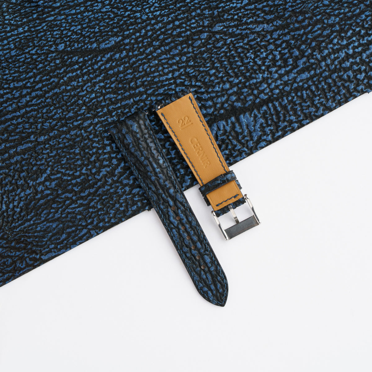 Tan Zermatt leather lining on the back of the black blue shark padded watch strap