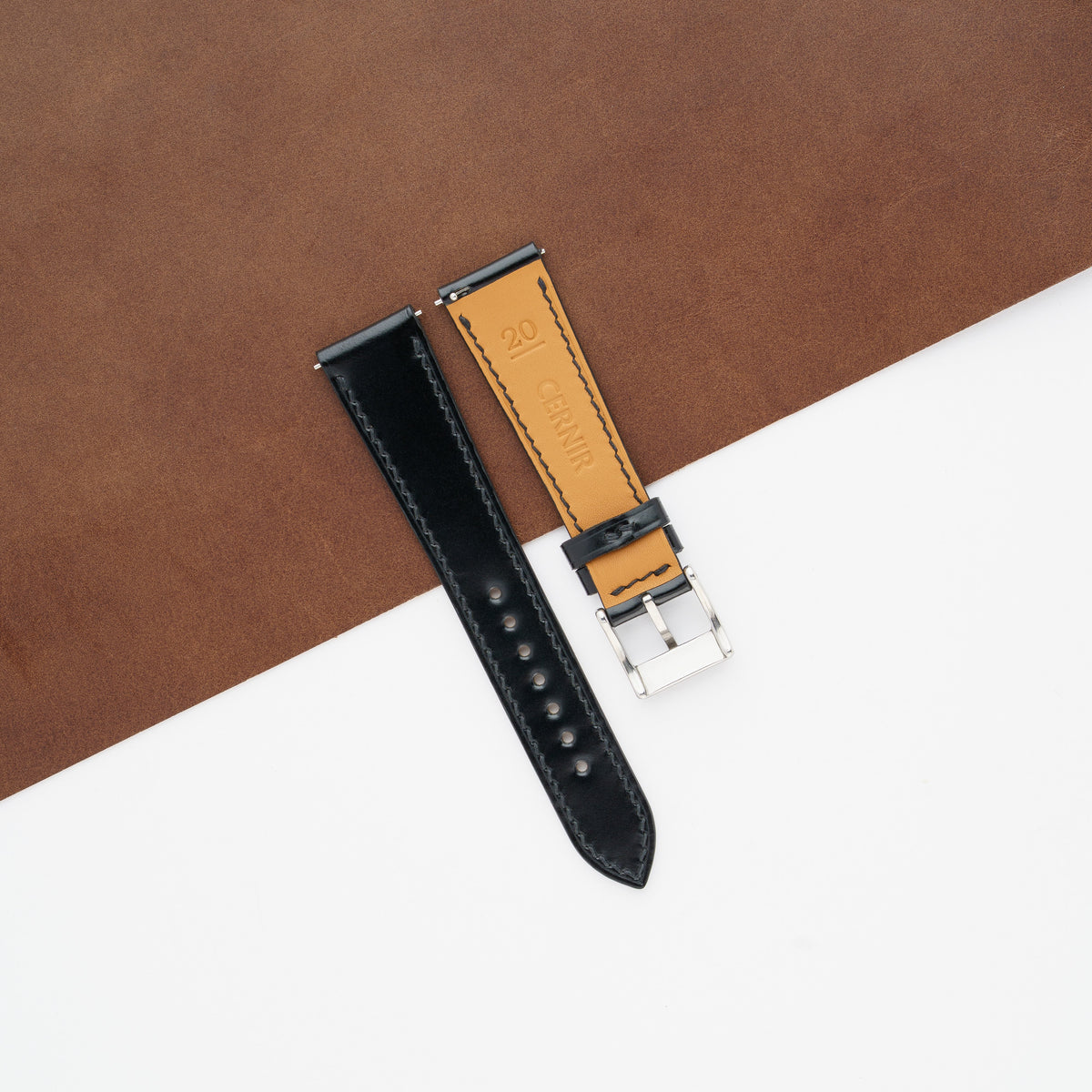 Tan Zermatt leather lining on the back of the black shell cordovan slim watch strap