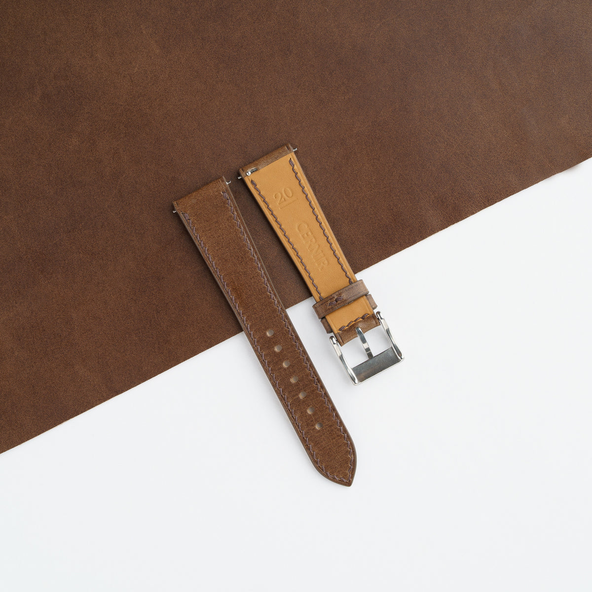Tan Zermatt leather lining on the back of the brown Buttero slim watch strap