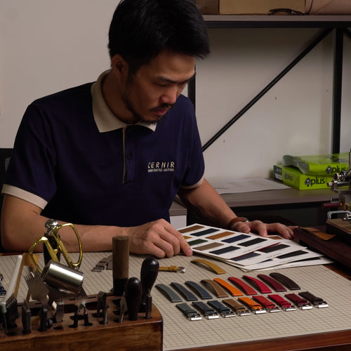 Selecting leather colors and strap samples at the work table