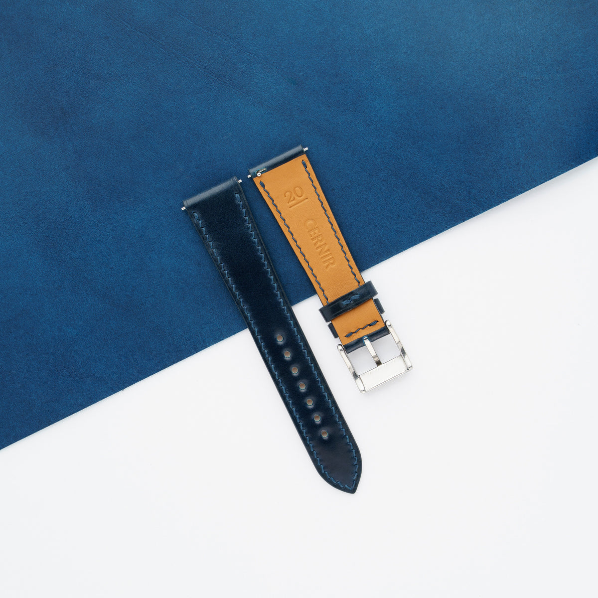 Tan Zermatt leather lining on the back of the navy shell cordovan slim watch strap