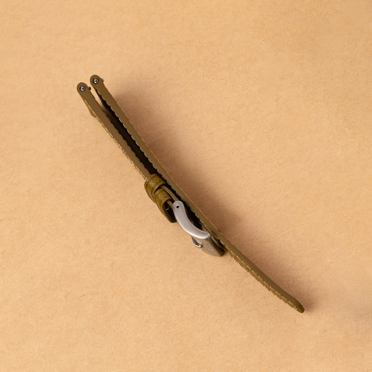 Side view of the mustard yellow Saffiano Hybrid Rally Pilot strap folded, showing its edge
