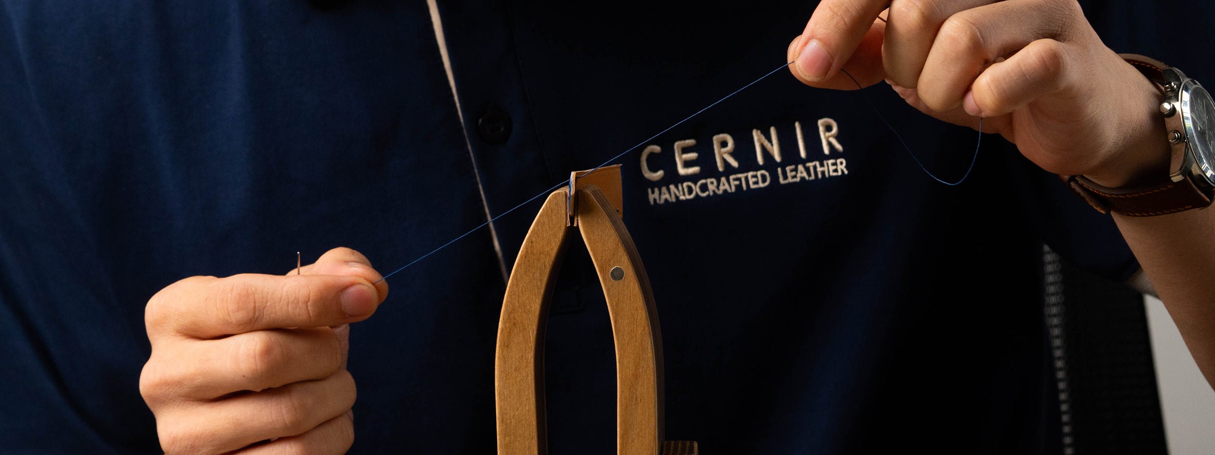 Hand stitching a leather watch strap
