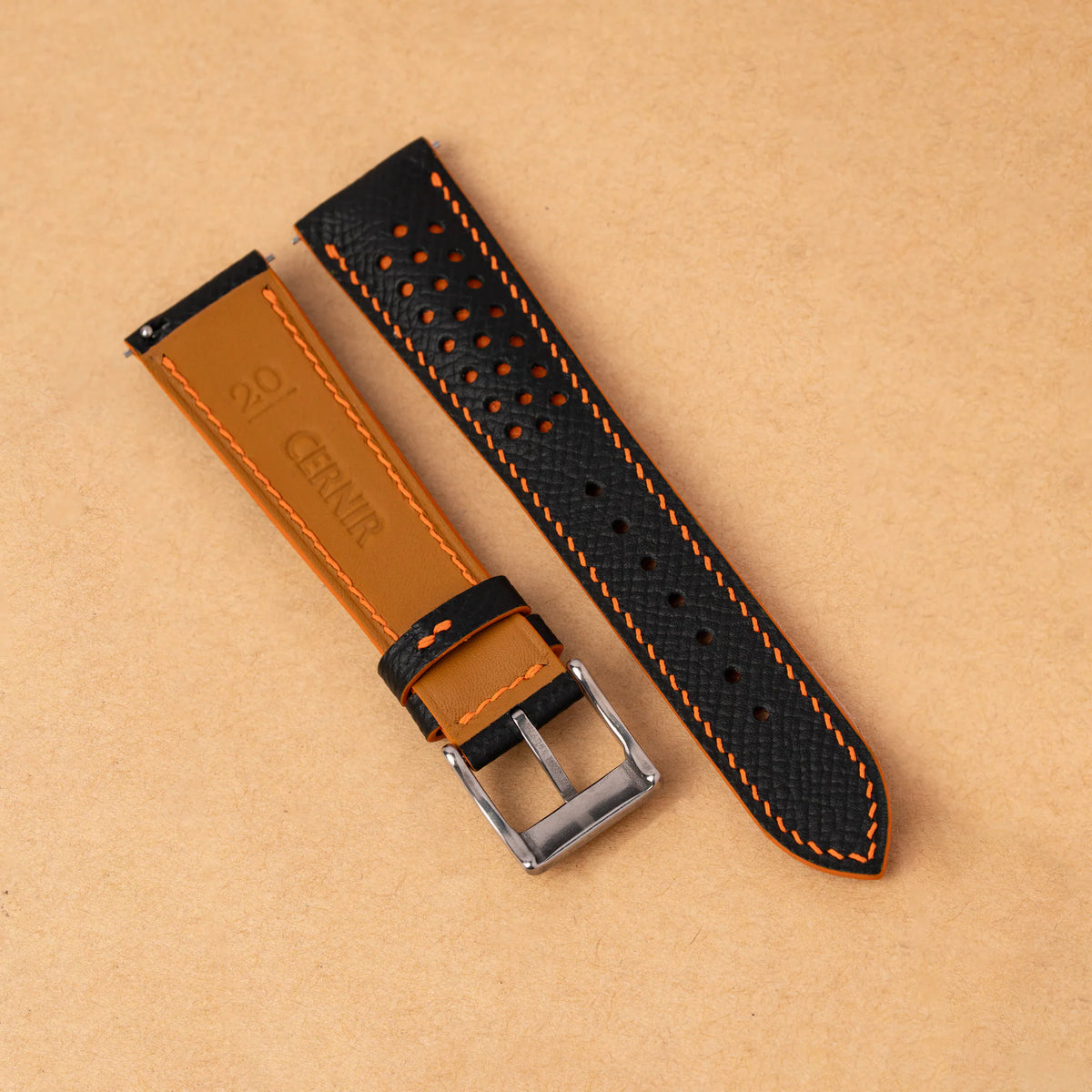 Golden-tan Zermatt leather lining with the Cernir stamp on the back of the black Racing Rally strap