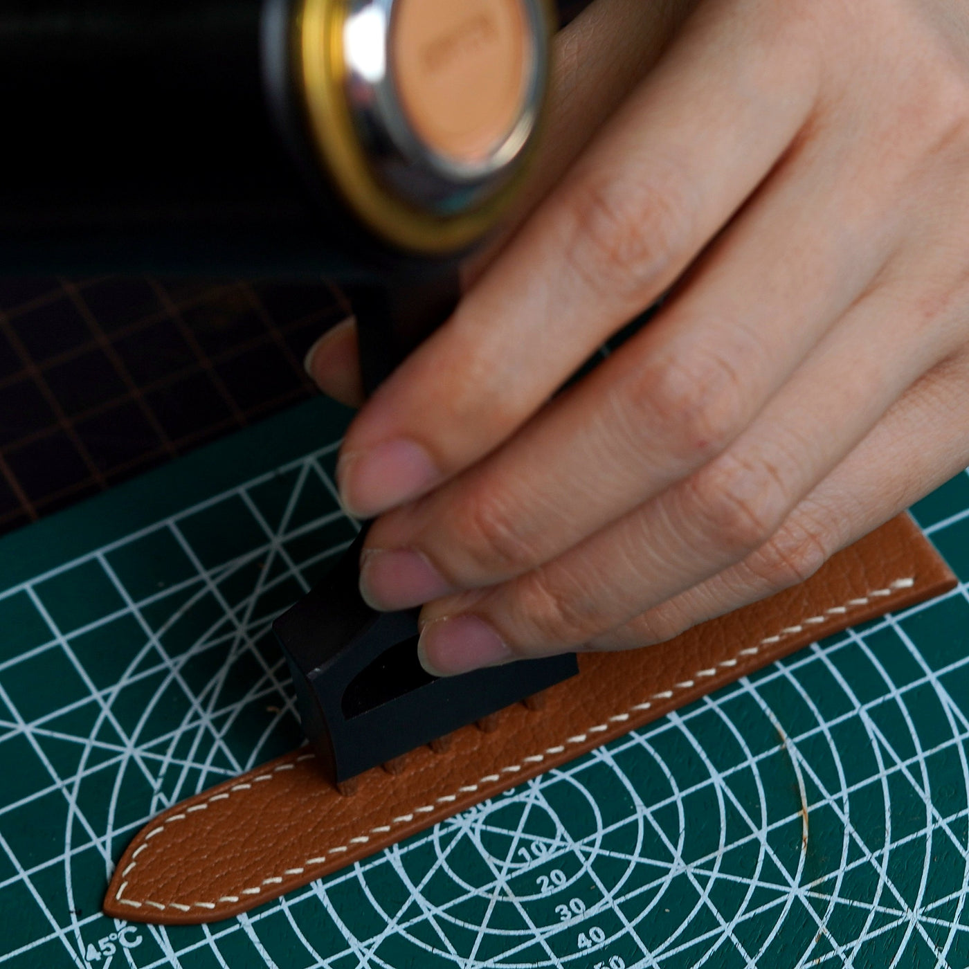 Strap Hole Punching