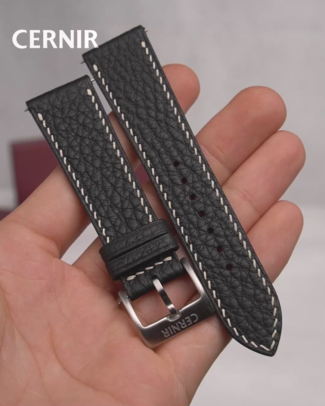 Video: Black Togo Leather Slim Watch Strap held in the hand, showing both pieces and the buckle