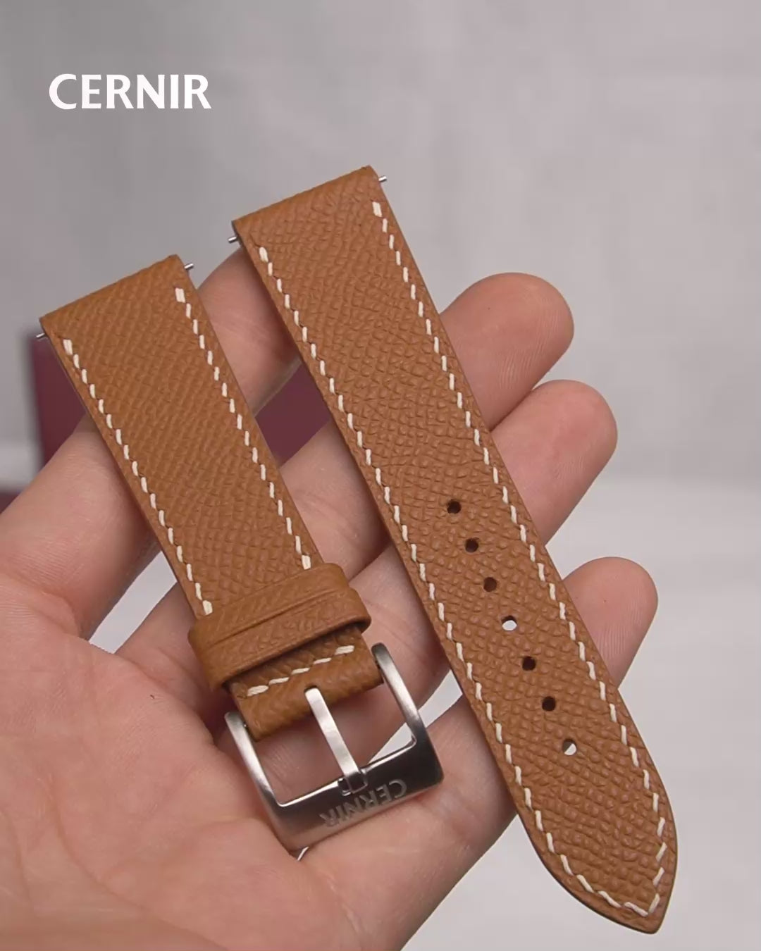 Video: Golden Brown Epsom Leather Slim Watch Strap held in the hand, showing both pieces and the buckle